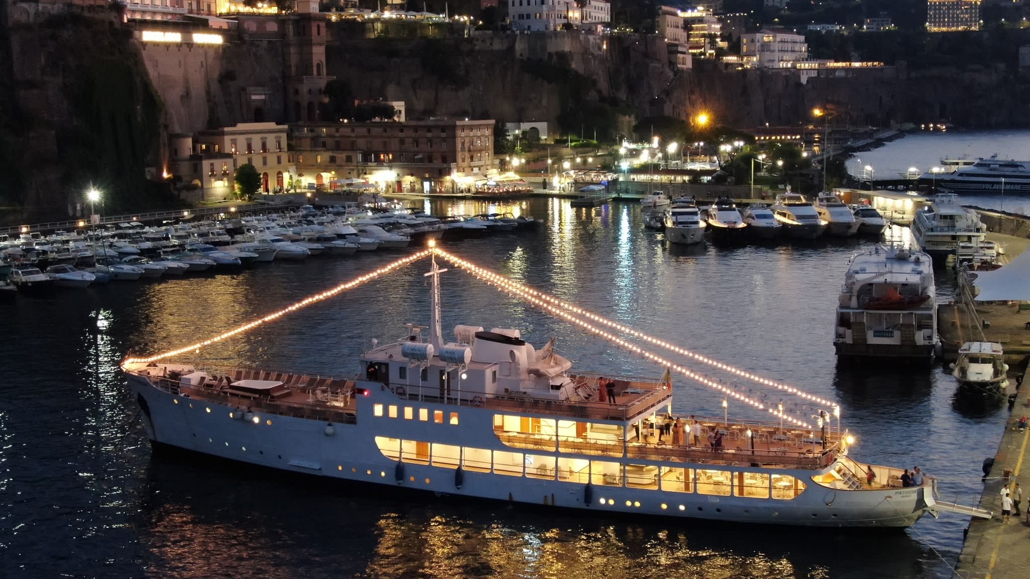 Motonave Patrizia illuminated in Sorrento harbour